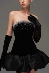 Crystal Embellished Black Dress With Voluminous Satin Hem