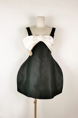 Black Sleeveless Mini Dress with Statement and Structured Skirt