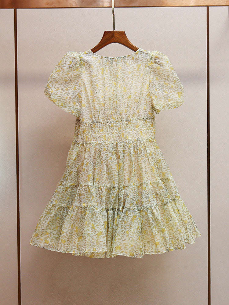 Printed V-neck mini dress in Yellow
