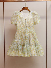 Printed V-neck mini dress in Yellow