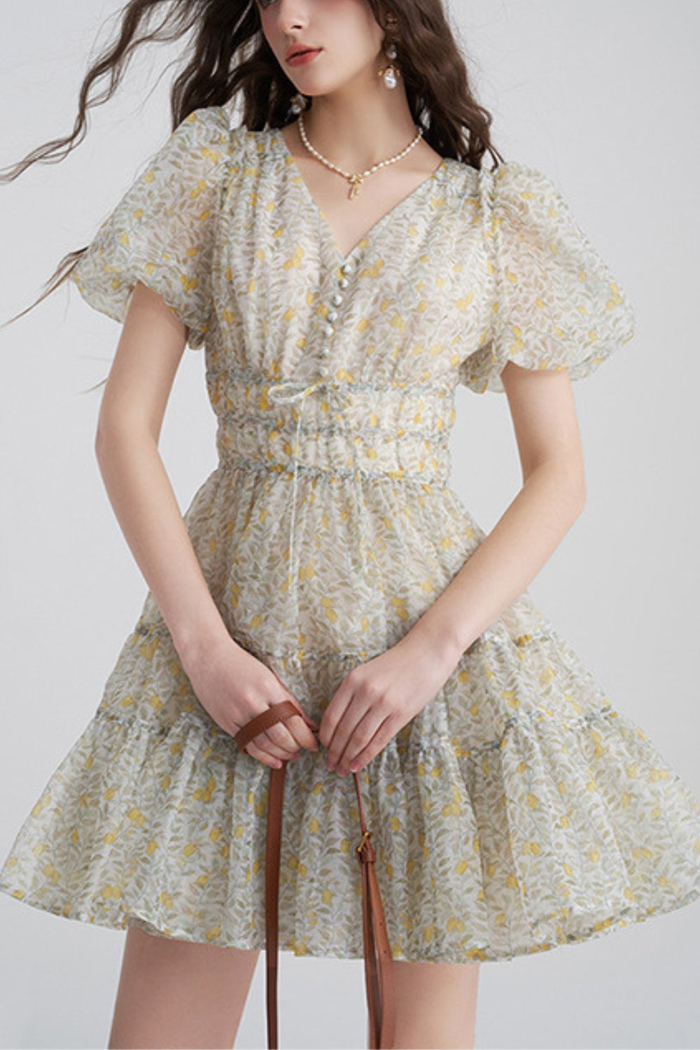 Printed V-neck mini dress in Yellow